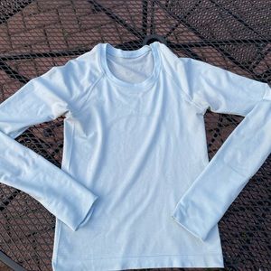 Lulu Lemon Swiftly Top.  Light Blue.  Size 2.